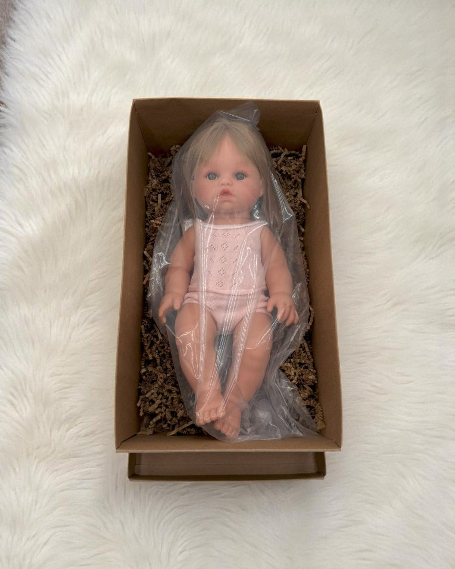 Baby dolls for toddlers Vienna with straight blonde hair and realistic vinyl construction for lasting play