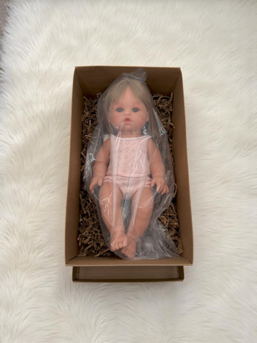 Baby dolls for toddlers Vienna with straight blonde hair and realistic vinyl construction for lasting play