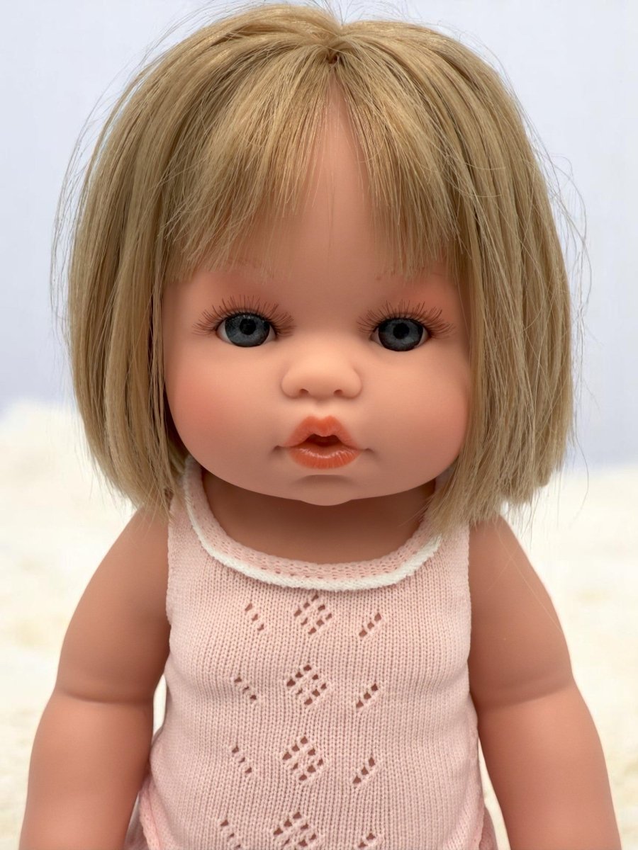 Lifelike Vienna baby doll with blue eyes and blonde bob haircut for toddlers emotional development