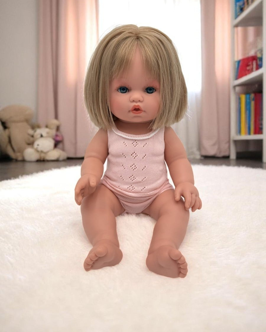 Vienna blonde baby doll with blue eyes and straight hair perfect for toddlers developmental play activities