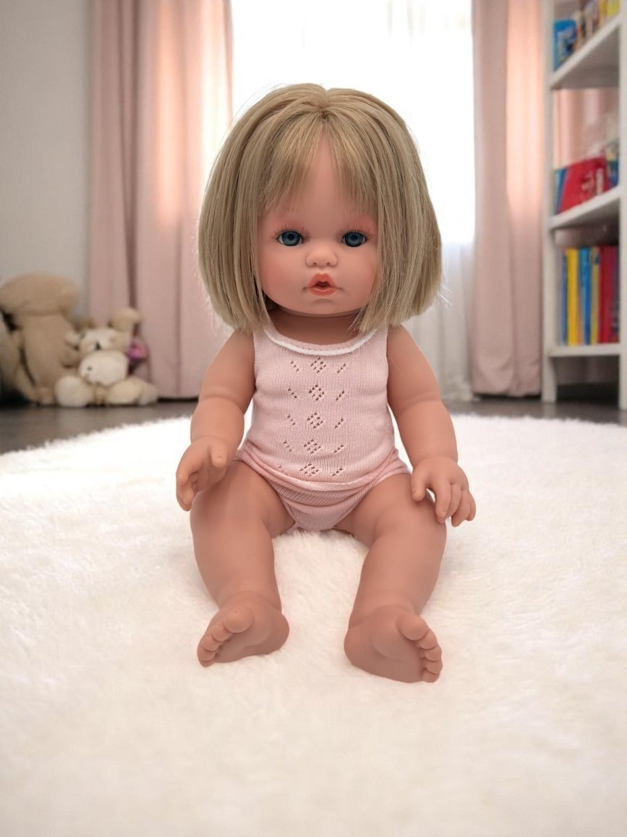 Vienna blonde baby doll with blue eyes and straight hair perfect for toddlers developmental play activities