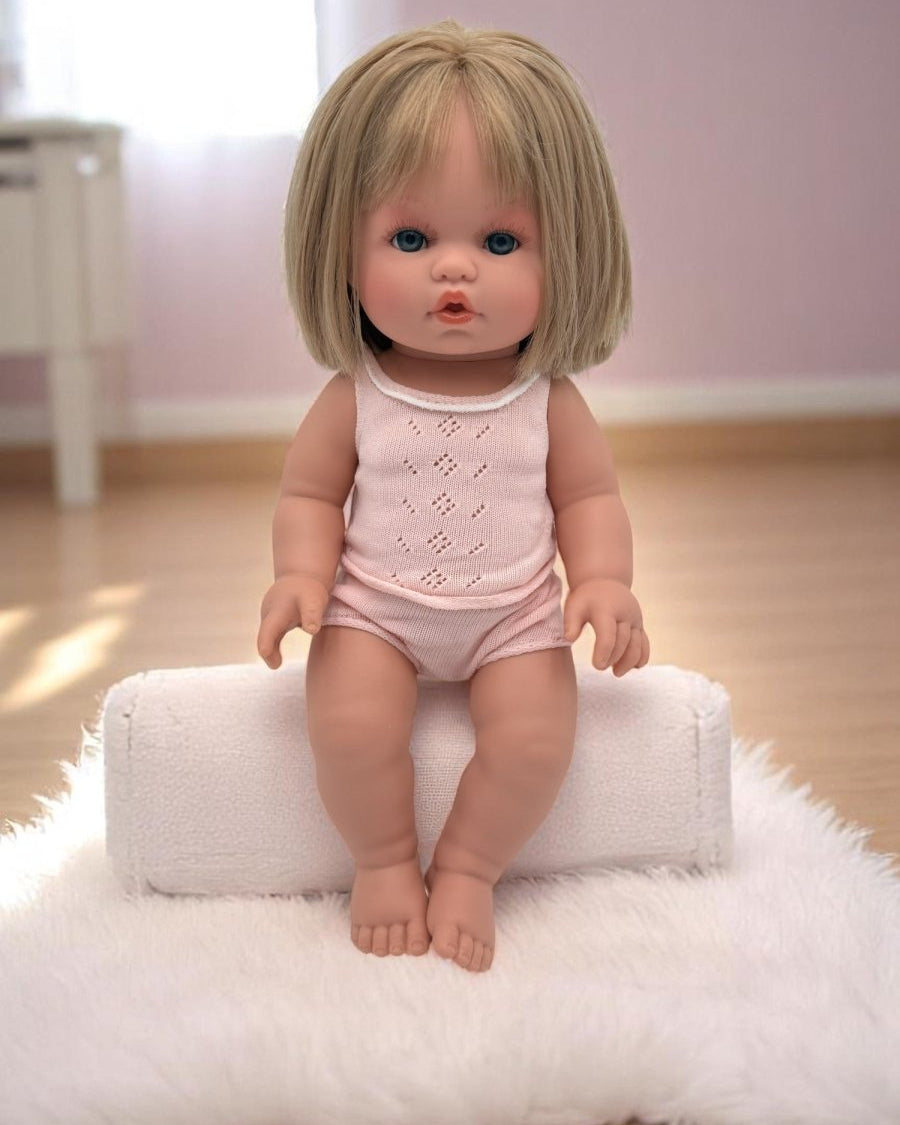 Real life baby doll Vienna featuring captivating blue eyes ideal for children's playroom nurturing experiences