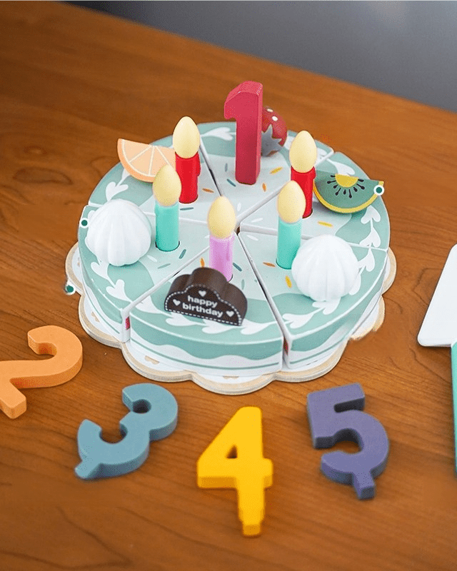 Velcro connection system on wooden Montessori cake toy allowing easy assembly for young children