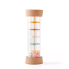 Close-up of Montessori rain sound toy showing pastel colored internal discs and rainbow beads