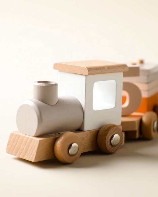 Close-up detail of wooden train car connection system showing quality craftsmanship