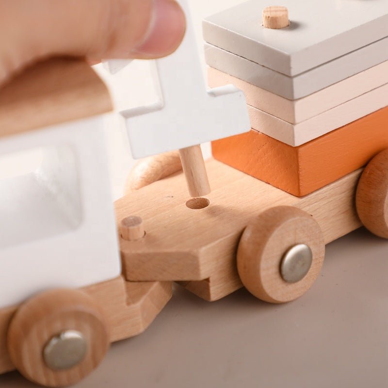 Complete Montessori wooden train set featuring engine and three unique cargo cars for developmental play