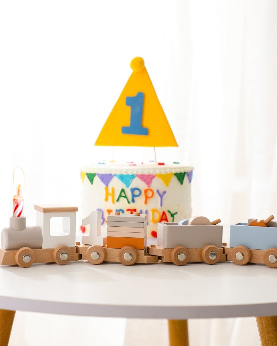 Wooden birthday train toy with decorative elements perfect for celebration displays