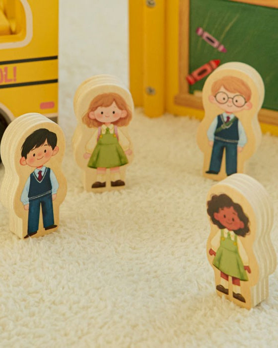 Dimensional diagram showing school bus at 7.2 inches long and character figures at 2.2 inches tall