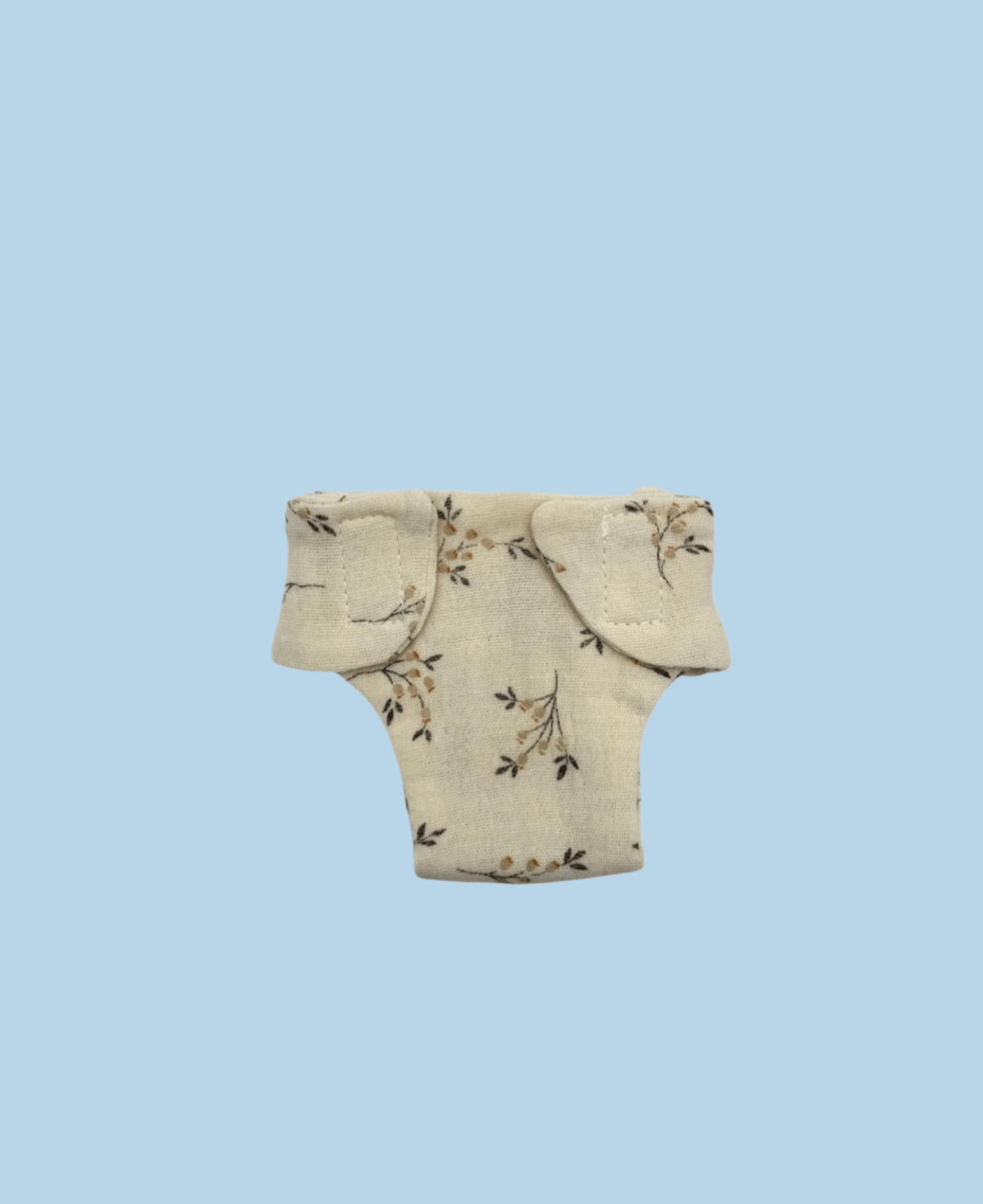 Floral baby doll outfit with garden-inspired prints