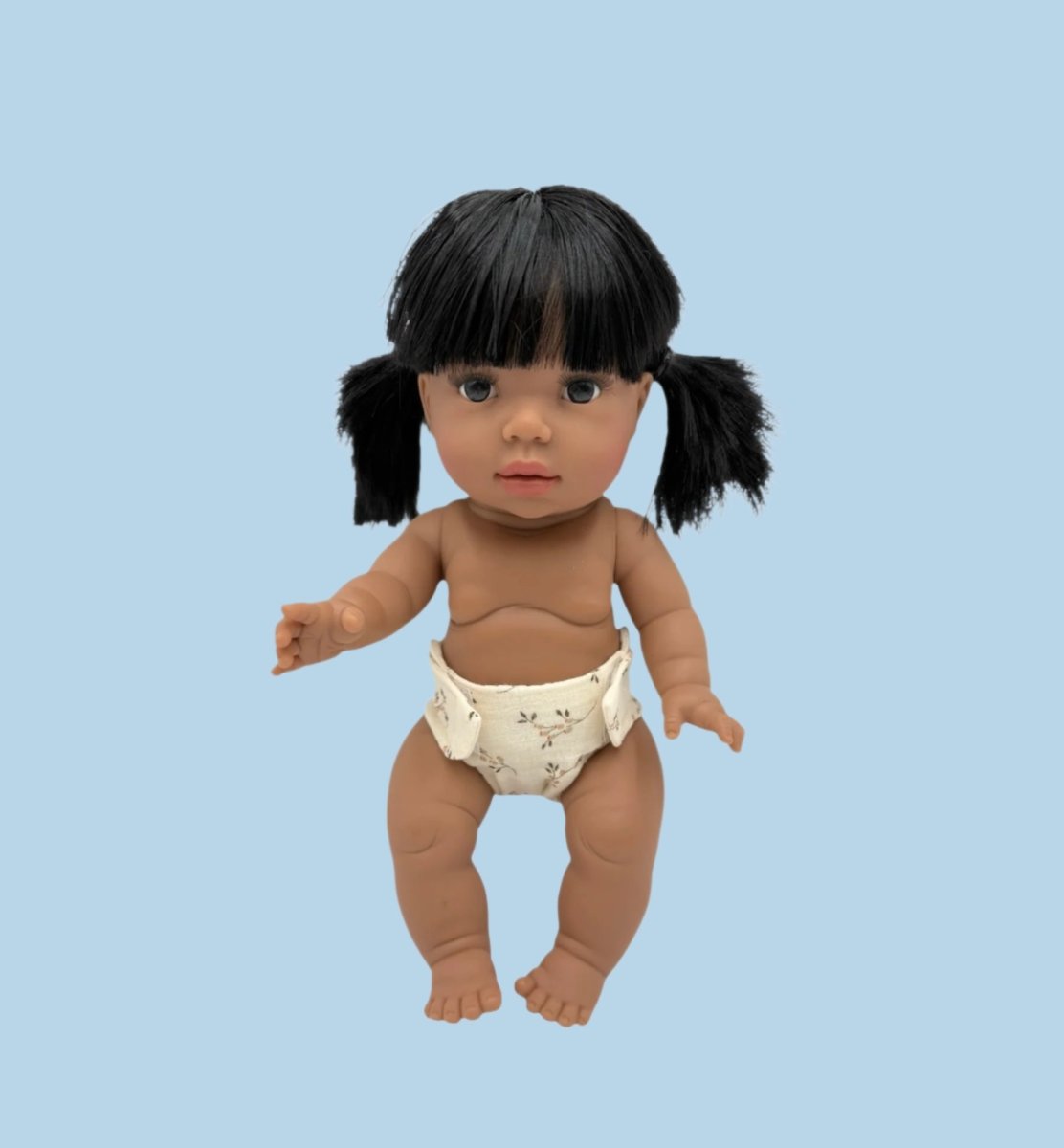 Baby doll fashion supporting developmental milestones