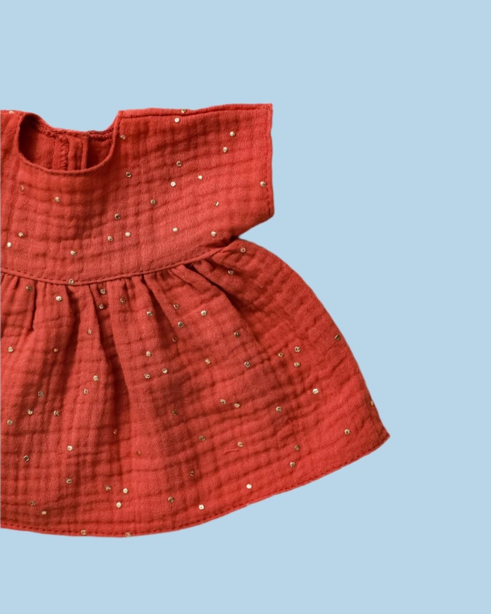 Baby doll clothes with hand-stitched hemline