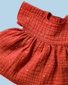 Baby doll clothes with hand-stitched hemline