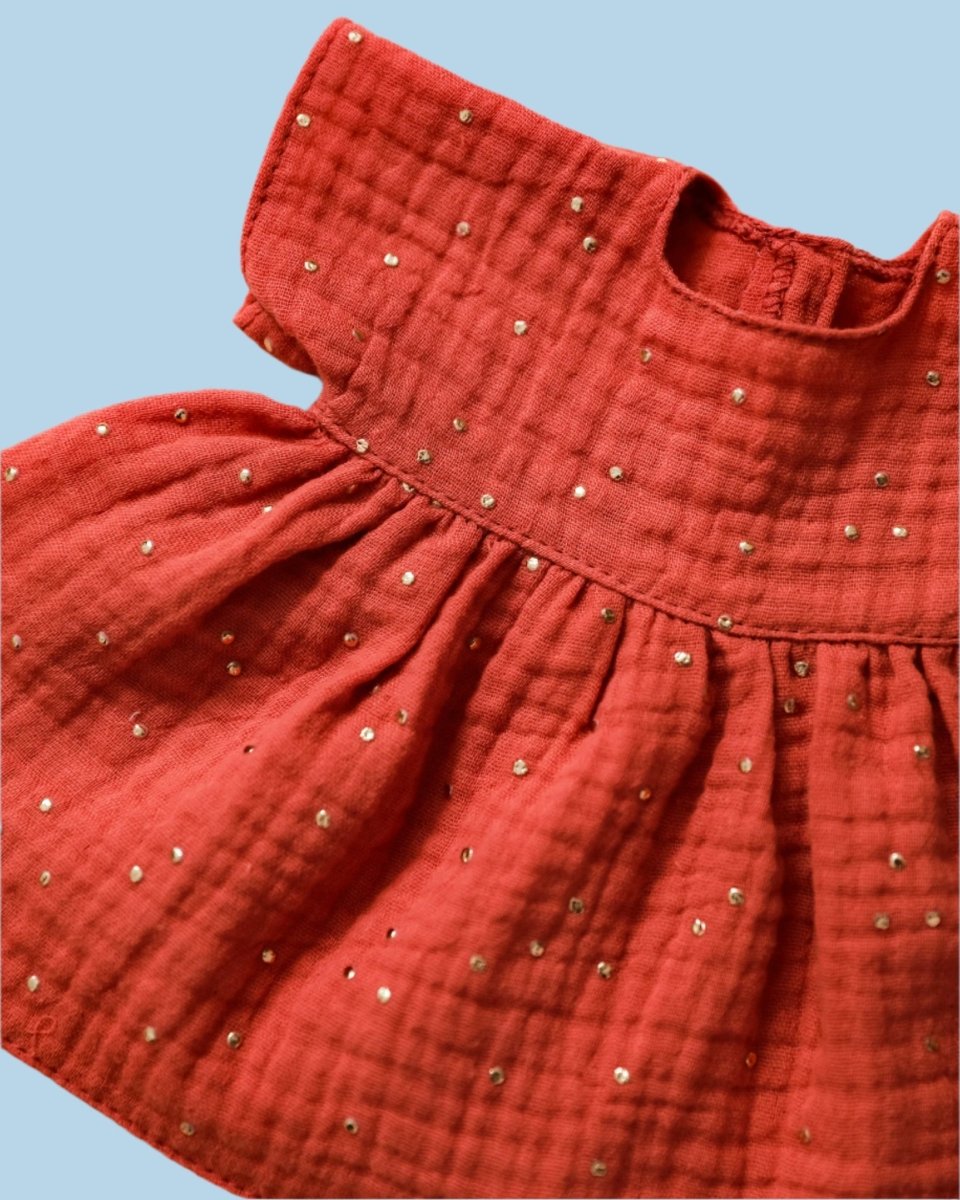 Baby doll clothes with hand-stitched hemline