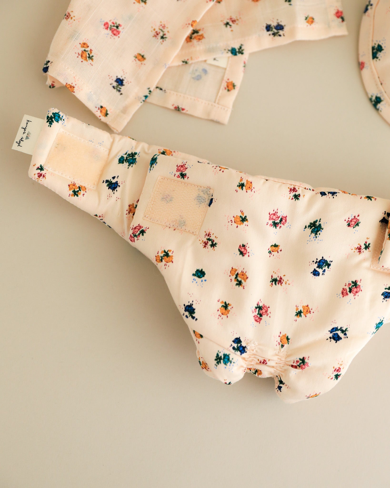 dolls, doll accessories, doll diaper, doll clothes, minikane doll, baby doll accessories