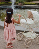Fleur coloré baby doll pram with under-basket storage and authentic French vintage styling