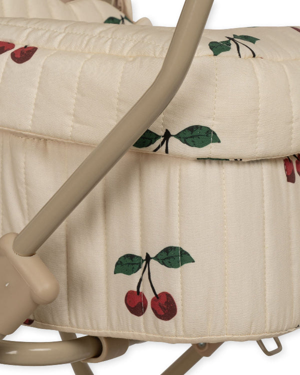 Vintage-style cherry pram with classic scallop edges and soft-grip handles perfect for wholesome doll adventures