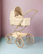 Vintage-style star pram with delicate scallop edges and soft-grip handles perfect for doll adventures