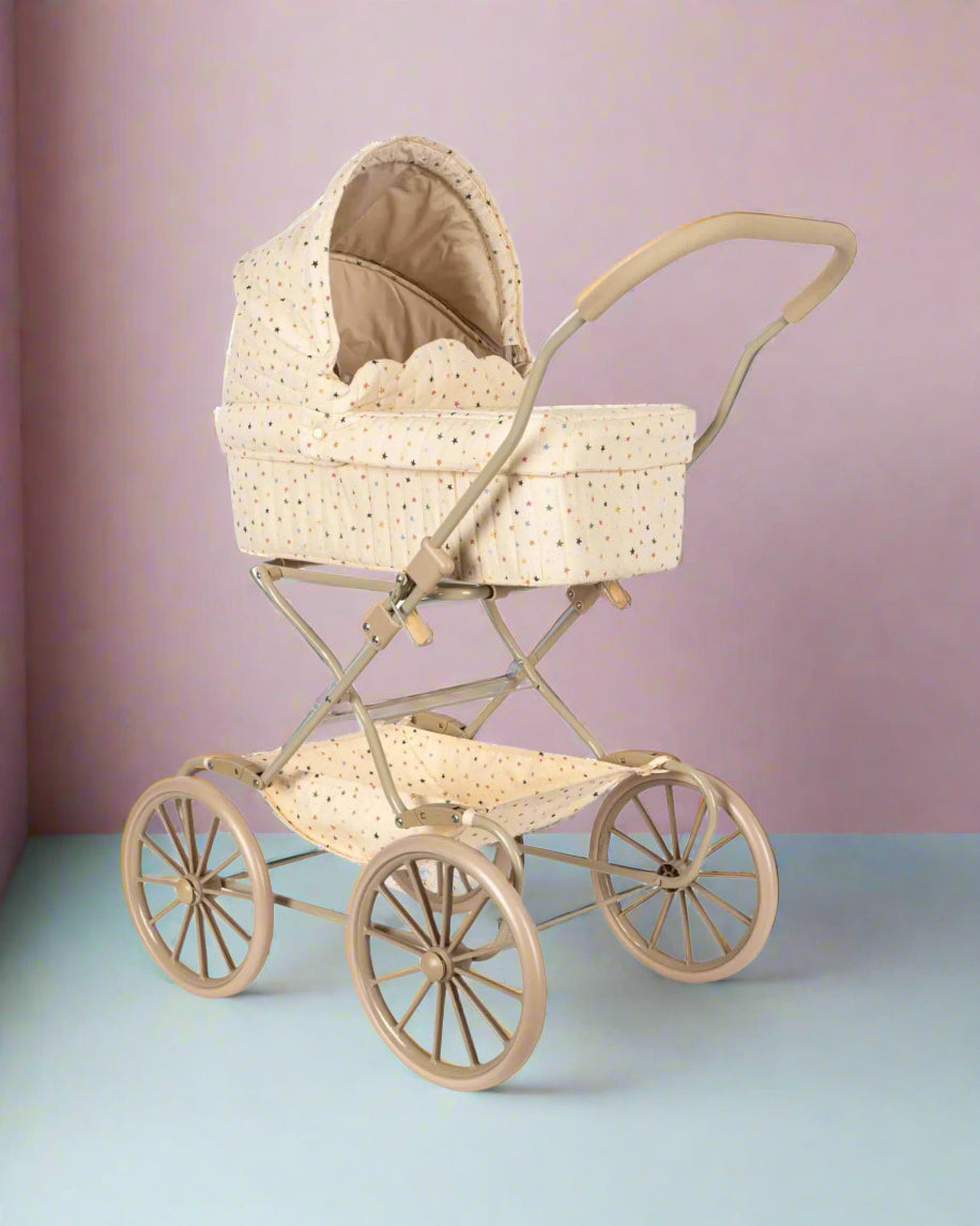 Vintage-style star pram with delicate scallop edges and soft-grip handles perfect for doll adventures