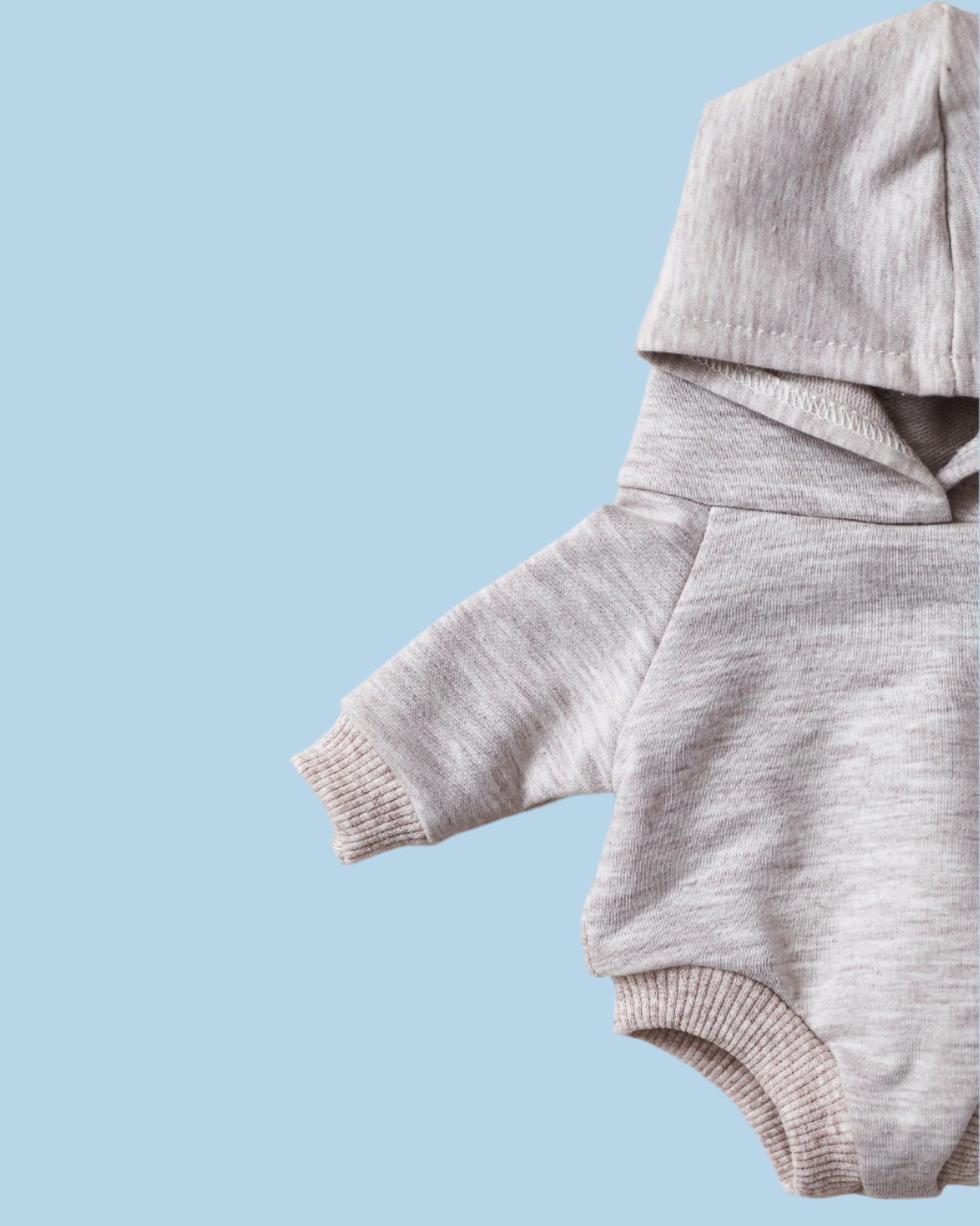 Easter-themed baby doll clothes with pastel colors