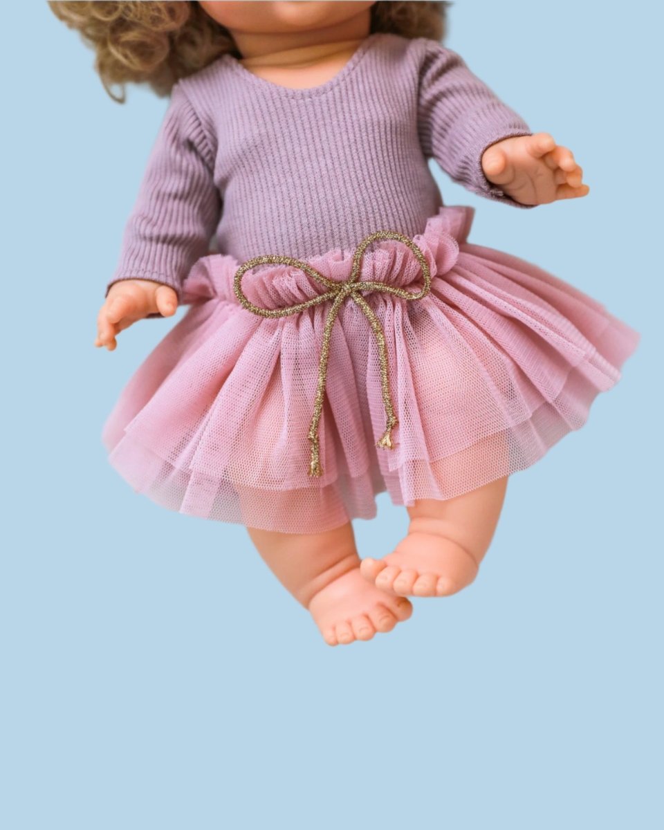 Winter holiday baby doll fashion with festive trim