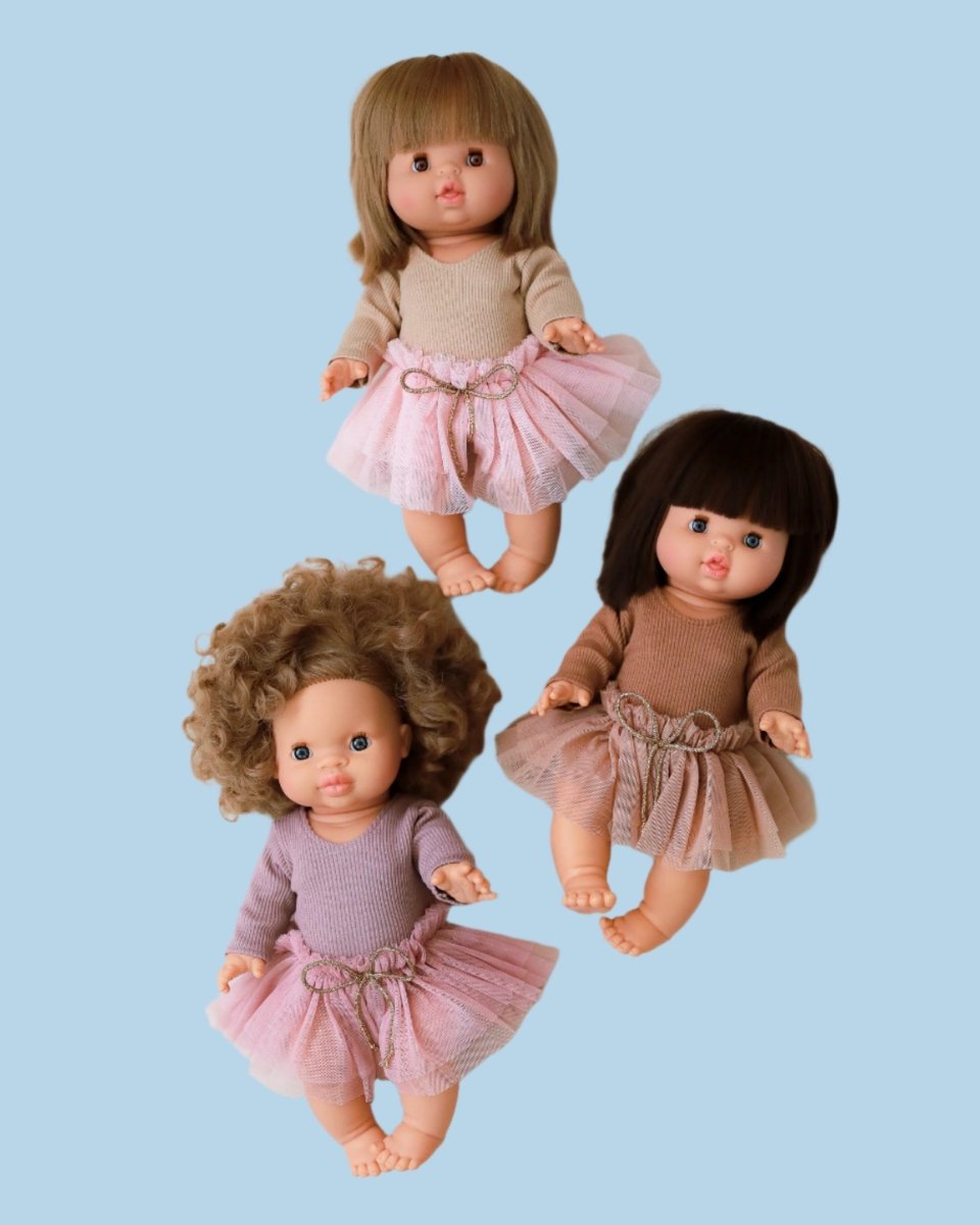 Handmade baby doll clothes in vibrant colors