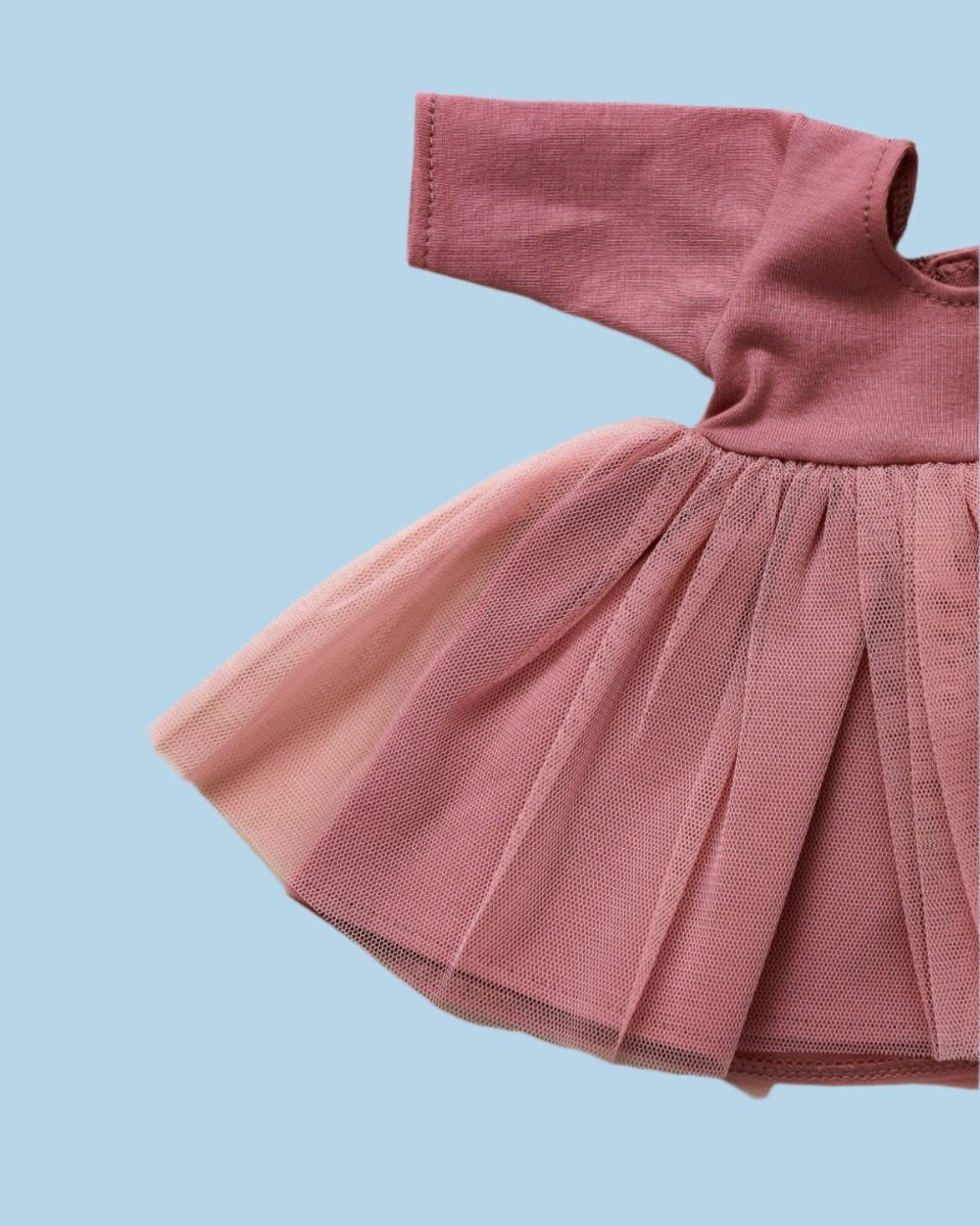 Elegant baby doll fashion with fine detailing