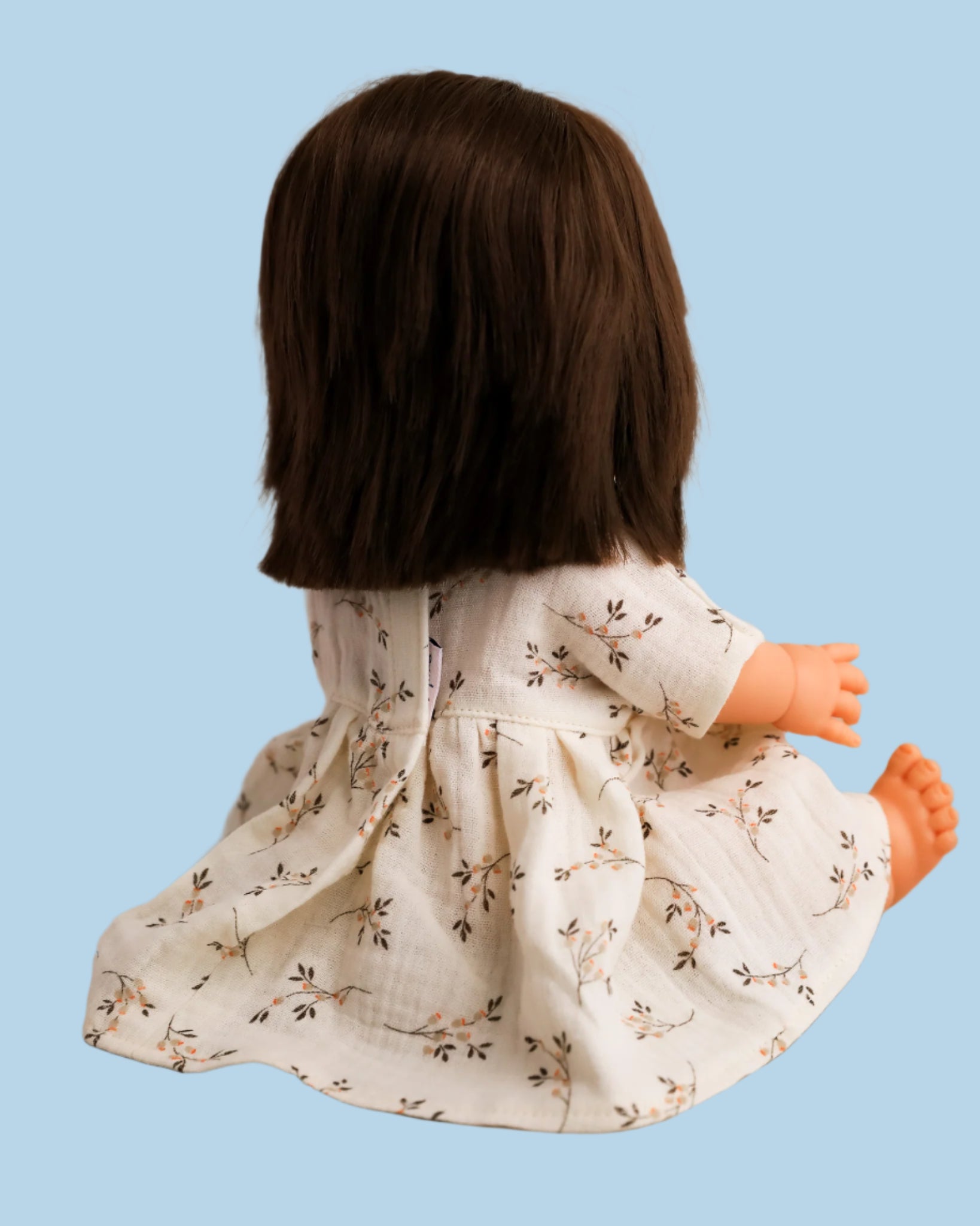 Baby doll clothes with sensory-rich textures