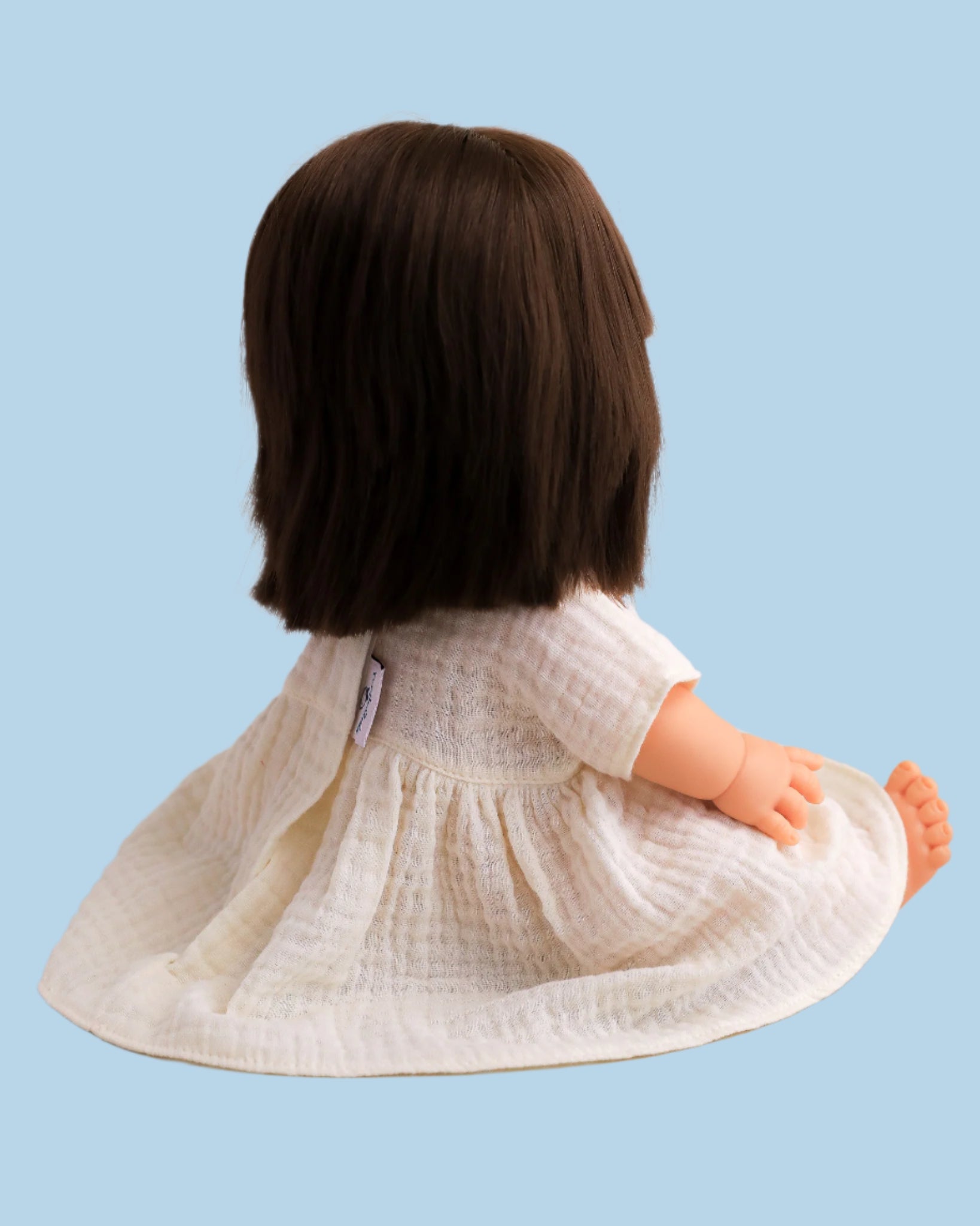 Doll fashion with decorative fagoting stitches