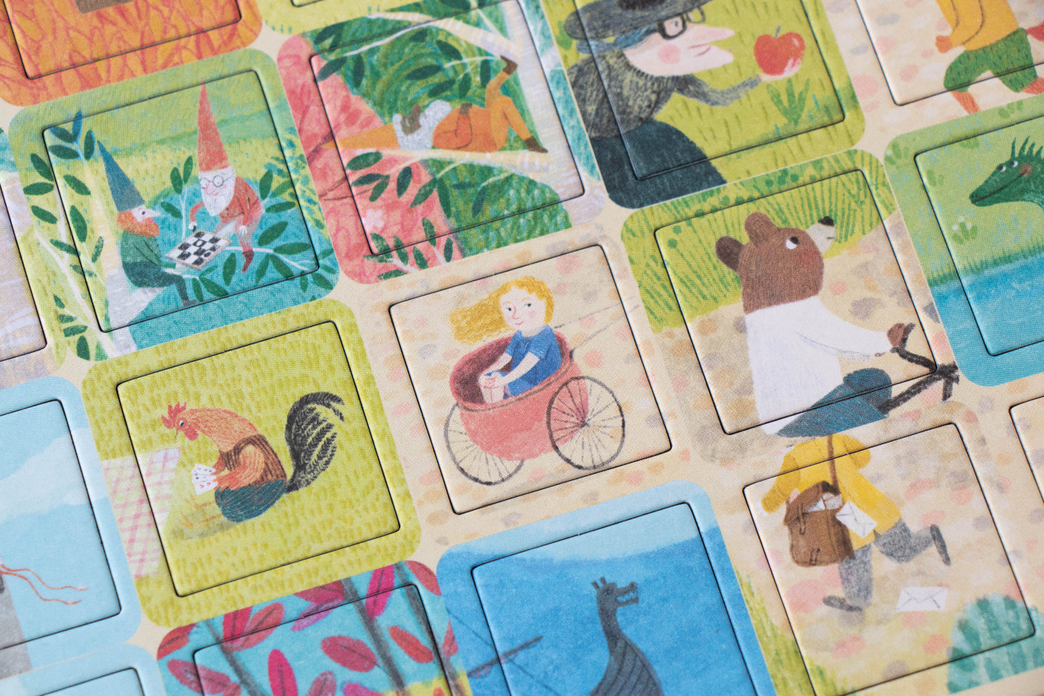 Colorful children's puzzle with illustrated scenes of animals and characters.