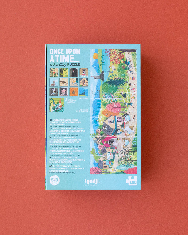 Jigsaw puzzle box with colorful images on a red background