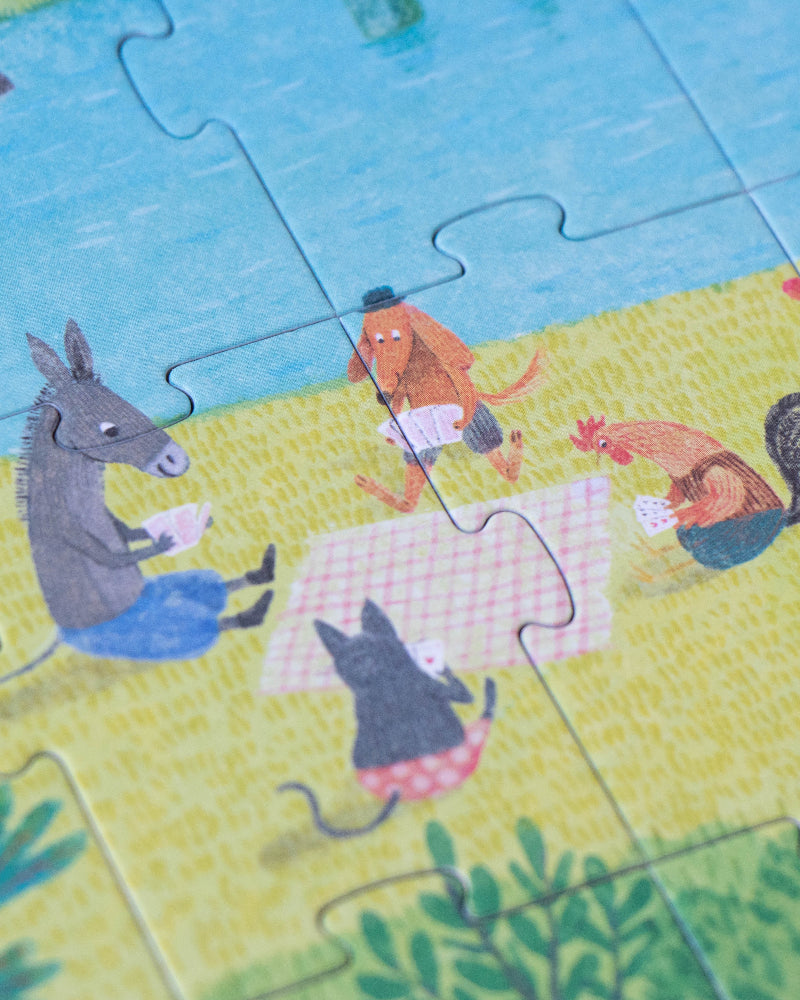 Children's puzzle with cartoon animals in a park setting
