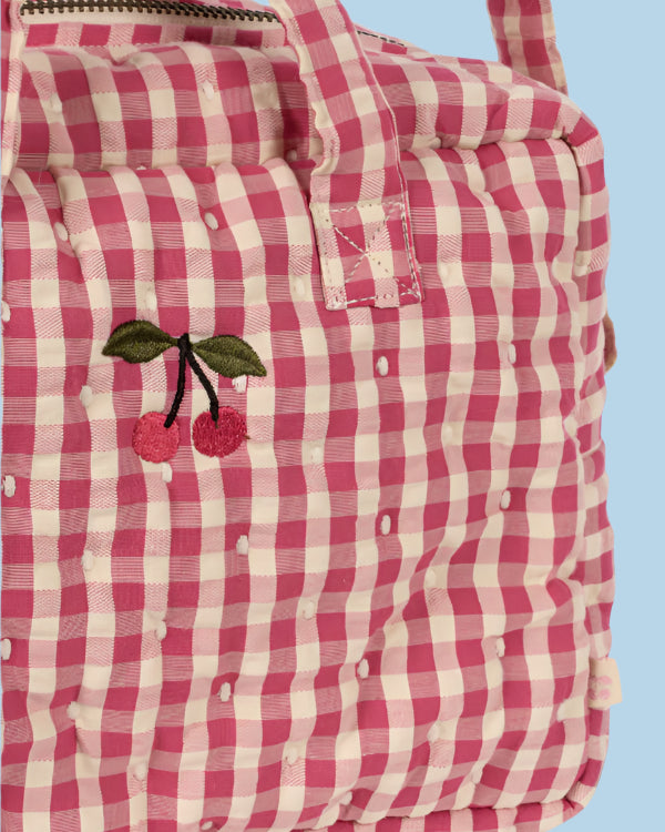 Premium cotton gingham diaper bag with multiple carrying options ideal for little caregivers