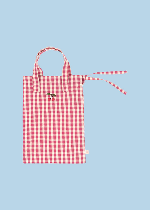 Cottage-style gingham doll bedding featuring delicate cherry accents and quality craftsmanship