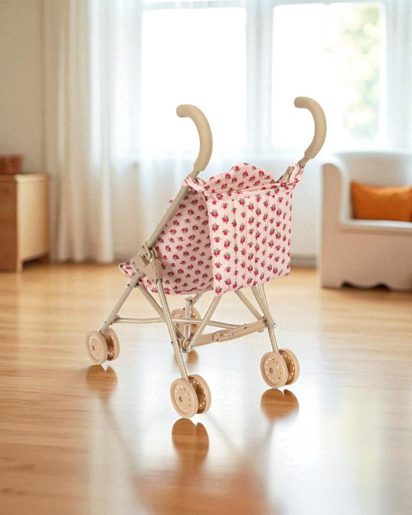 Full Rosie Rose doll stroller with vintage floral fabric, champagne frame and four-wheel mobility system