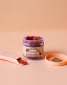Miniature play kitchen accessories including Tiny Harlow chocolate pudding doll food set