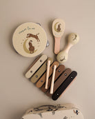 FSC-certified tiger-themed musical instruments showing croquer la vie French design details