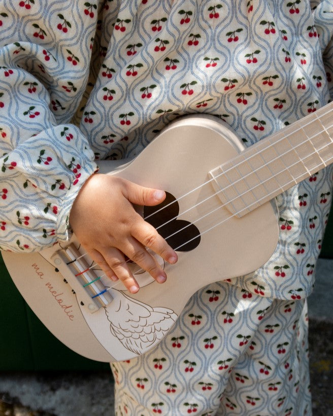 Wooden swan-themed ukulele with 4 nylon strings and tunable pegs perfect for small hands