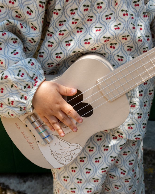 Wooden swan-themed ukulele with 4 nylon strings and tunable pegs perfect for small hands