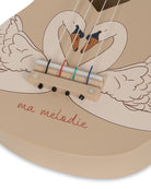 Elegant swan print ukulele with sustainable wood construction ideal for musical development