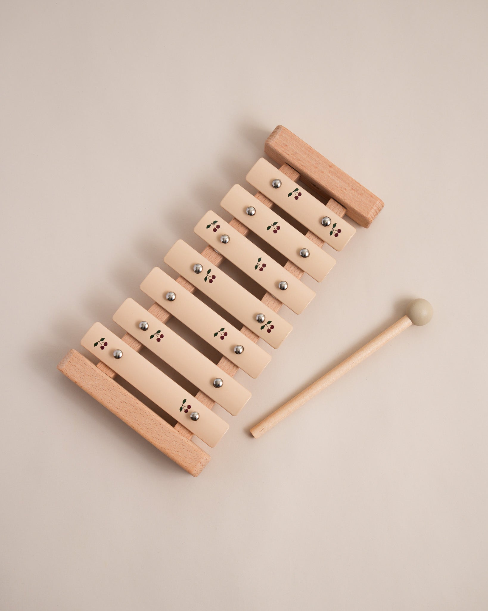 Wooden cherry print xylophone with natural wood frame and aluminum bars plus wooden mallet