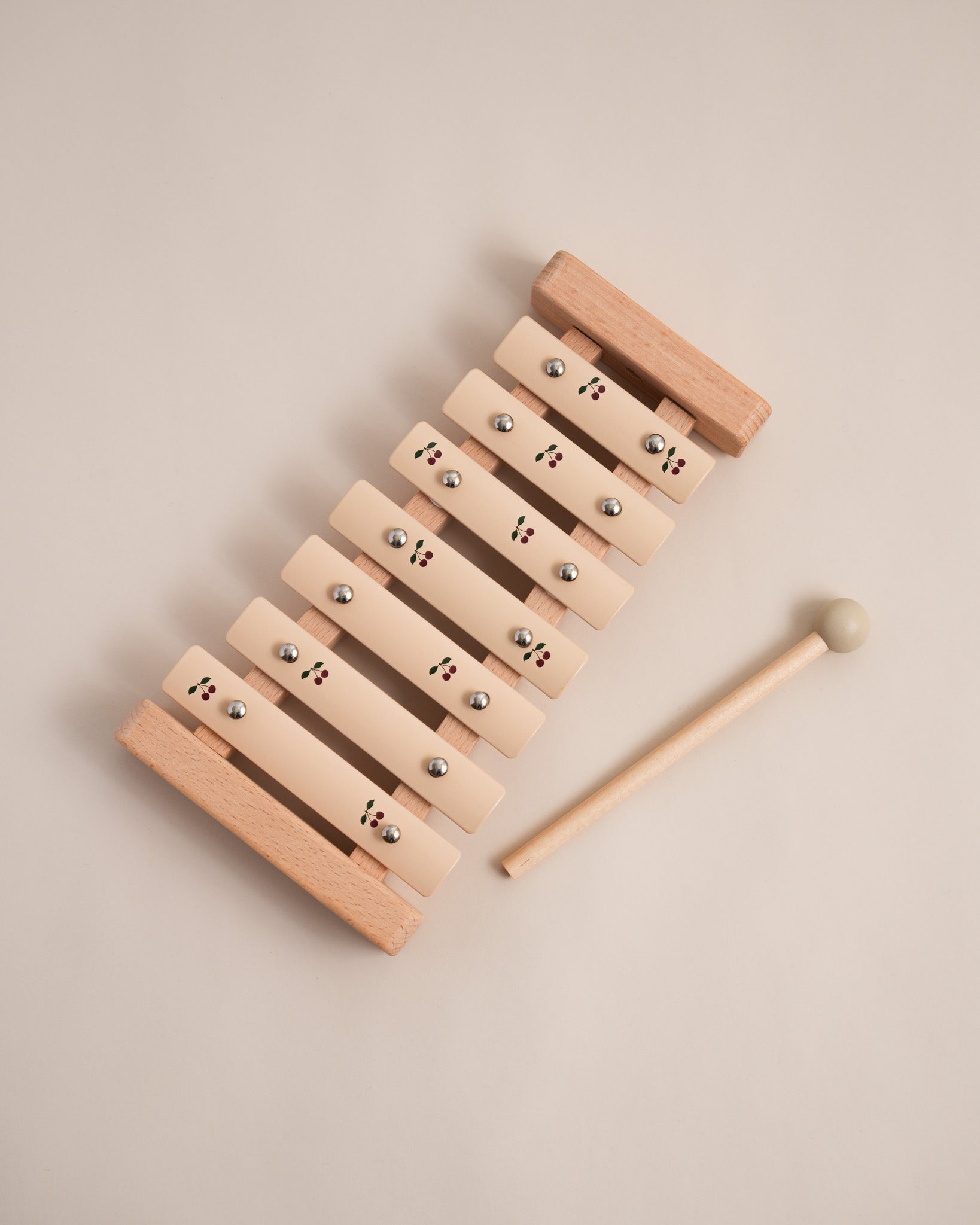 Wooden cherry print xylophone with natural wood frame and aluminum bars plus wooden mallet