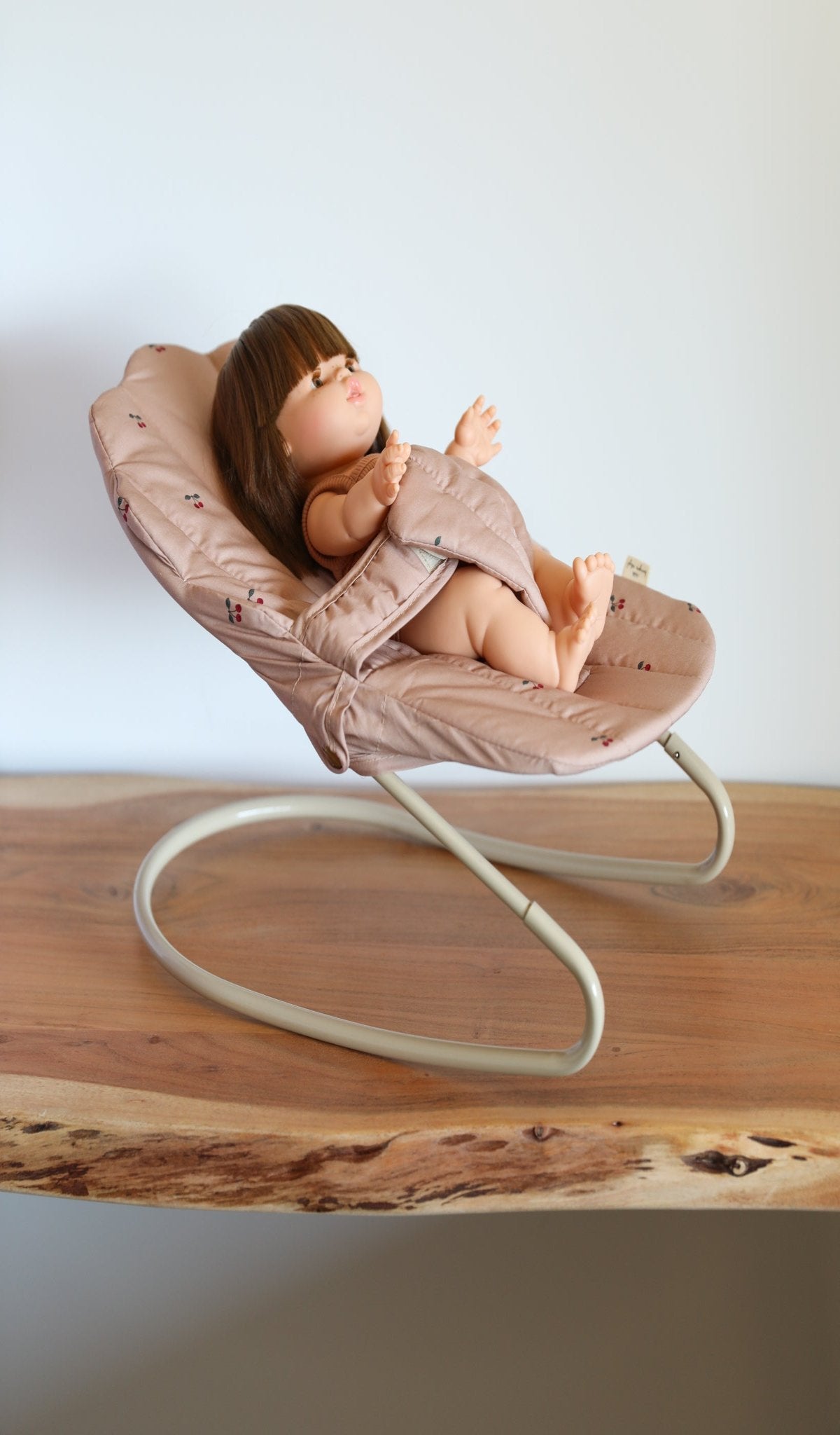 Playroom-favorite doll furniture including fabric-lined baby bouncer