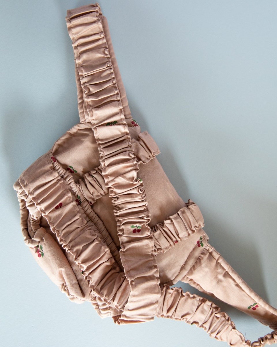 Essential doll accessories: front-facing baby doll carrier for little caregivers