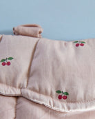 Playroom favorite: adjustable doll carrier with secure fastening