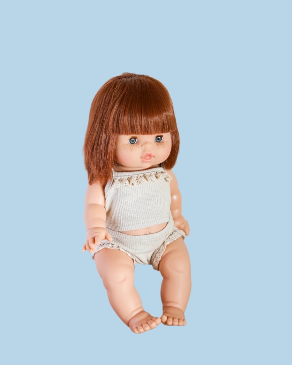 Doll outfit featuring hand-embroidered details