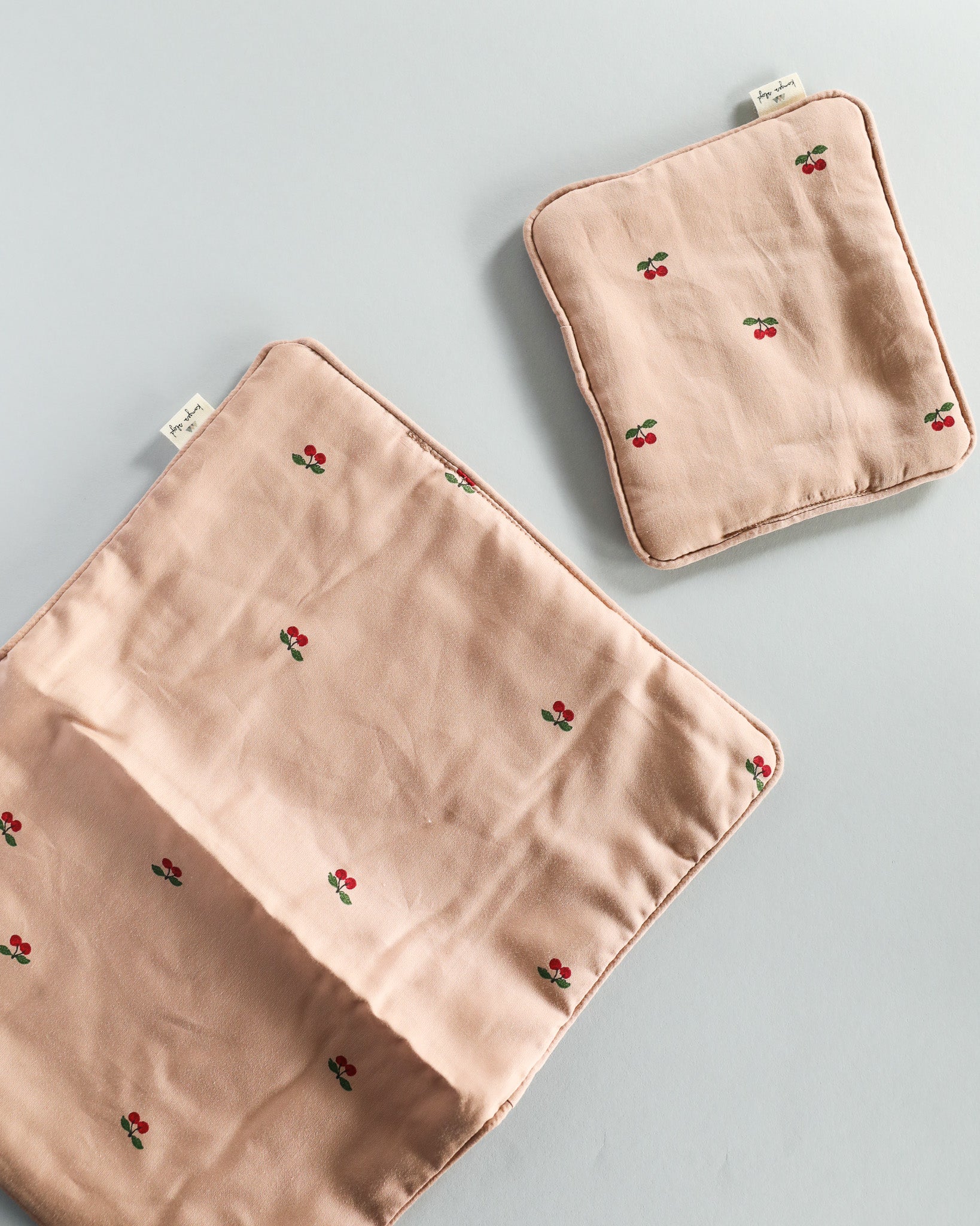 Playroom essential: soft fabric doll bedding with decorative elements