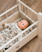 Doll accessories featuring cozy blanket and supportive pillow combination