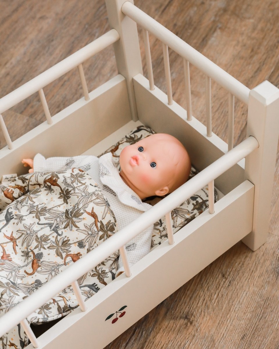 Doll accessories featuring cozy blanket and supportive pillow combination