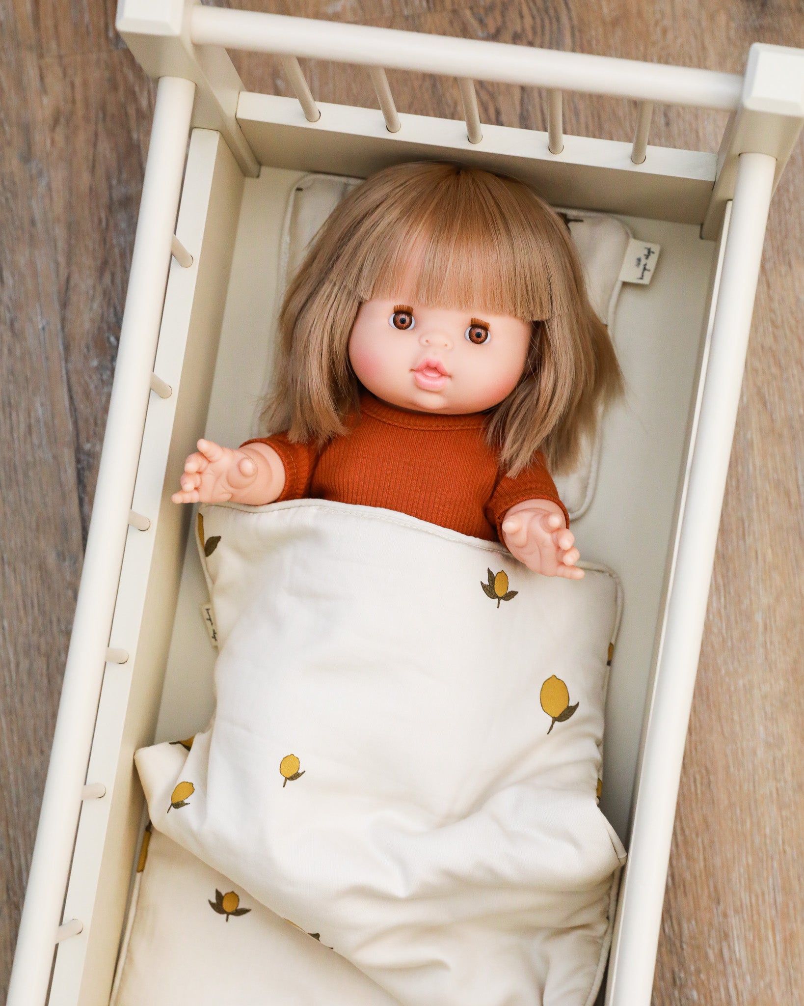 Playroom treasure: miniature pillow and quilted blanket for dolls