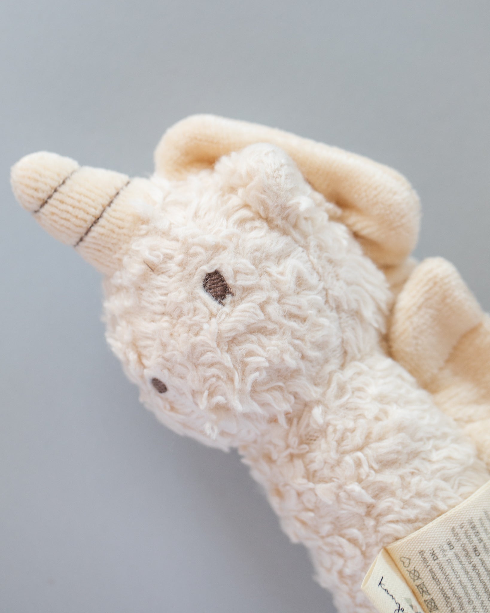 Organic cotton unicorn rattle with gentle bell inside perfect for newborn sensory development